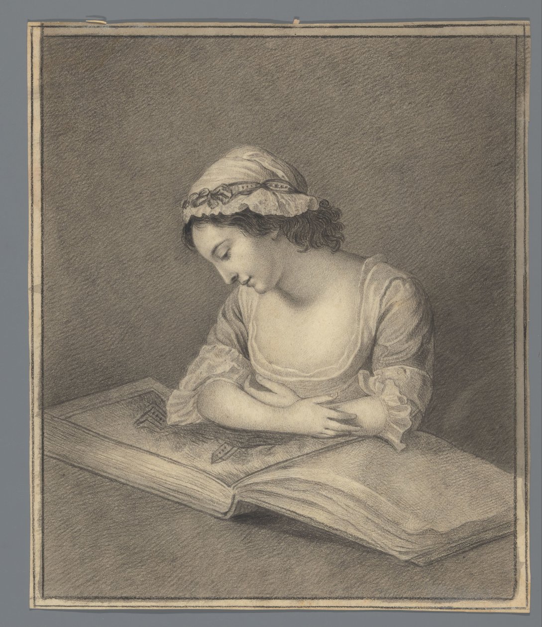 امرأة شابة مع كتاب مصور بواسطة مجهول